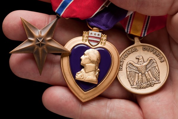 Man holding purple heart