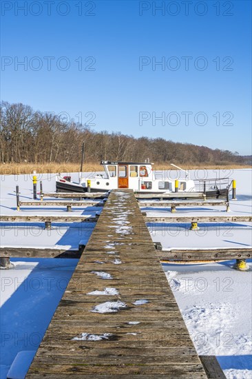 Ship frozen in ice on Lake Templin