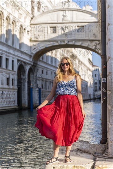 Young woman with red skirt