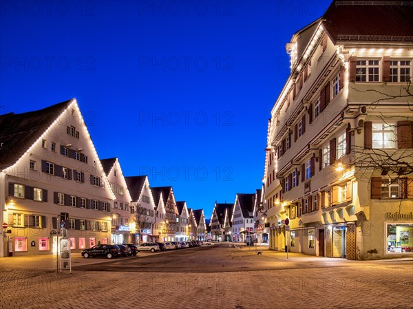 Illuminated houses at the market place