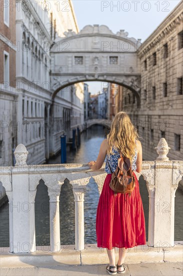 Young woman with red skirt