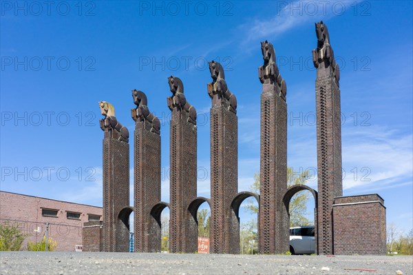 Stone horse gate in the municipal park of Magdeburg