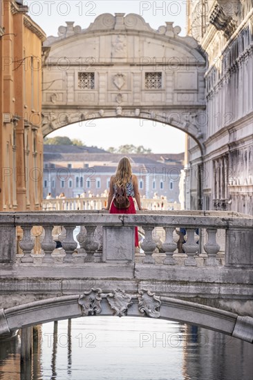 Young woman with red skirt