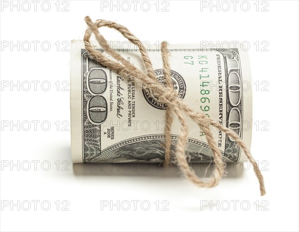 Roll of one hundred dollar bills tied in burlap string isolated on a white background