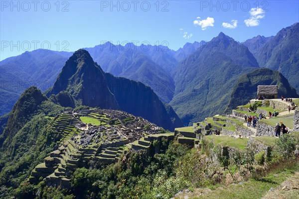 Inca ruined city with Mount Huayna Picchu