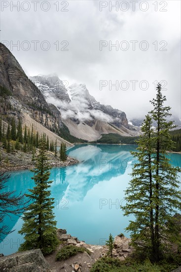 Clouds hanging between mountain peaks