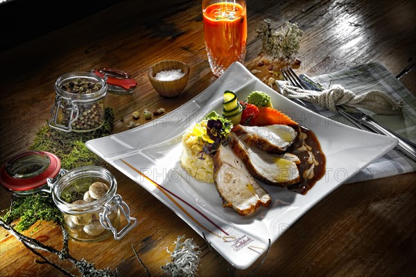 Turkey breast with sauce and risotto