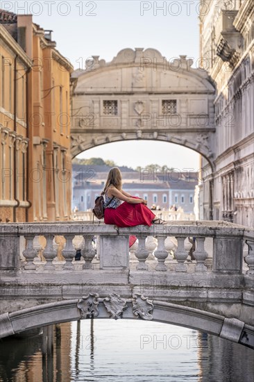 Young woman with red skirt