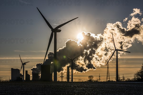 Wind turbines and coal-fired power plant