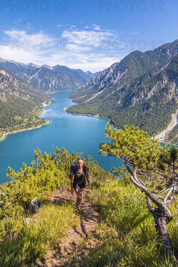 Hiker walking at Plansee