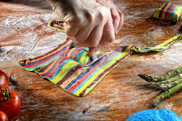 Fresh ravioli with ravioli cutter