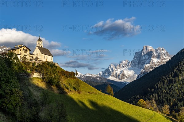 Church of Colle Santa Lucia with peak of Monte Pelmo in the background