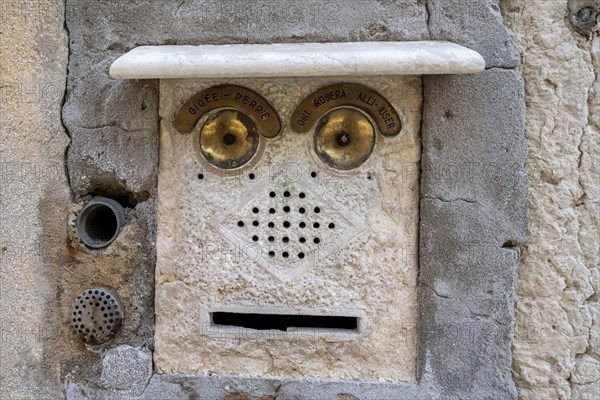 Doorbell on a house wall