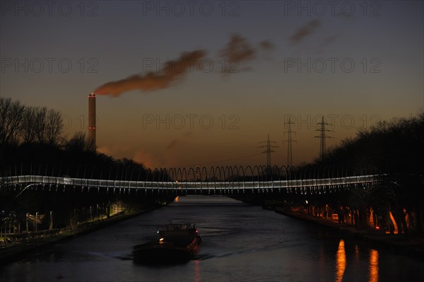 Rhine-Herne-Canal with illuminated Rehberger bridge