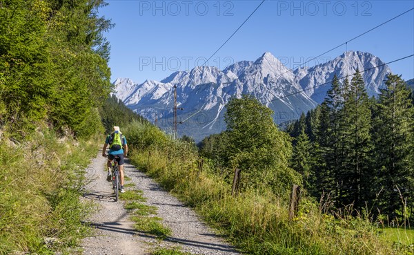 Cyclist on bike tour with mountain bike