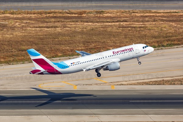 A Eurowings Airbus A320 with the registration D-ABNH takes off from Palma de Majorca Airport