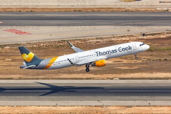 A Thomas Cook Airbus A321 with the registration G-TCDK takes off from Palma de Majorca Airport