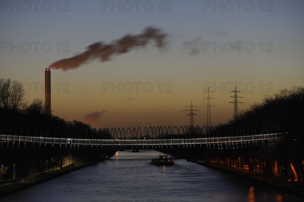 Rhine-Herne-Canal with illuminated Rehberger bridge
