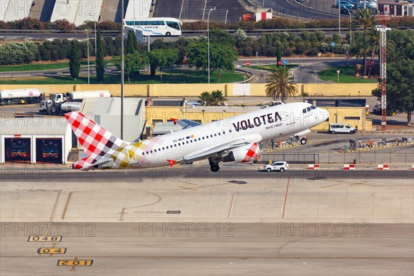 A Volotea Airbus A319 with the registration EC-MUX takes off from Palma de Majorca Airport