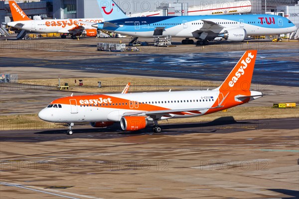 An easyJet Airbus A320 with registration G-EZOZ at London Gatwick Airport