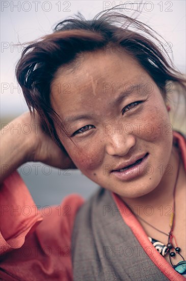 Portrait of a young Tibetan woman