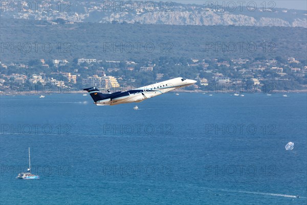 An Embraer ERJ-135BJ Legacy 650 aircraft of Air Hamburg with registration D-AHOX takes off from Palma de Majorca Airport