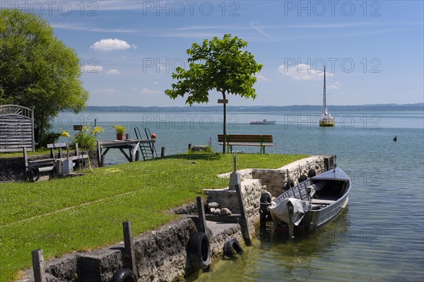 Boat on the shore of Fraueninsel