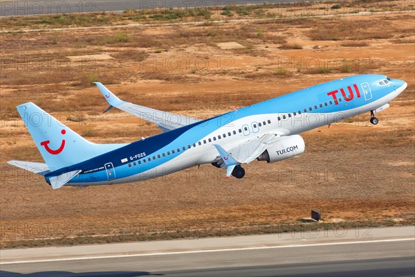 A TUI Boeing B737-800 with the registration G-FDZS takes off from Palma de Majorca Airport