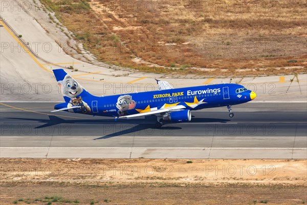 A Eurowings Airbus A320 with the registration D-ABDQ and the special livery Europa Park takes off from the airport in Palma de Majorca