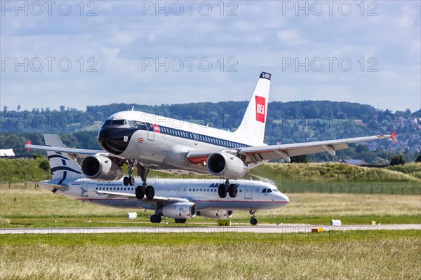 An Airbus A319 aircraft of British Airways with the registration G-EUPJ in the retro special livery lands at Stuttgart Airport