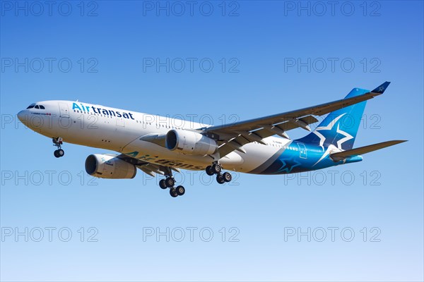 An Air Transat Airbus A330-200 with registration C-GUBH lands at Charles de Gaulle Airport