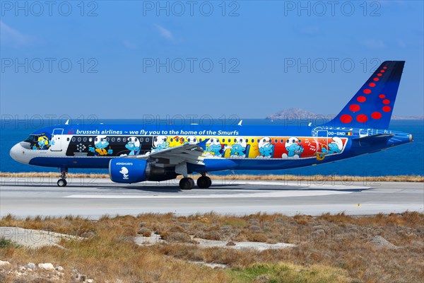 An Airbus A320 aircraft of Brussels Airlines with the registration number OO-SND with the special livery The Smurfs at Heraklion Airport