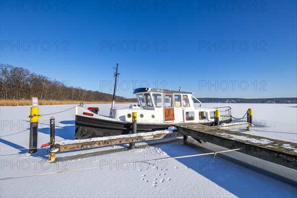 Ship frozen in ice on Lake Templin