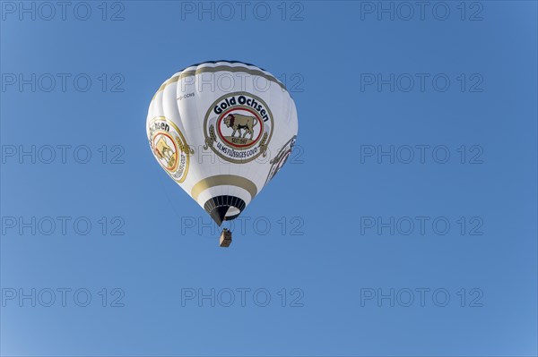A moving hot air balloon during the Montgolfiade 2020 in Bad Wiessee