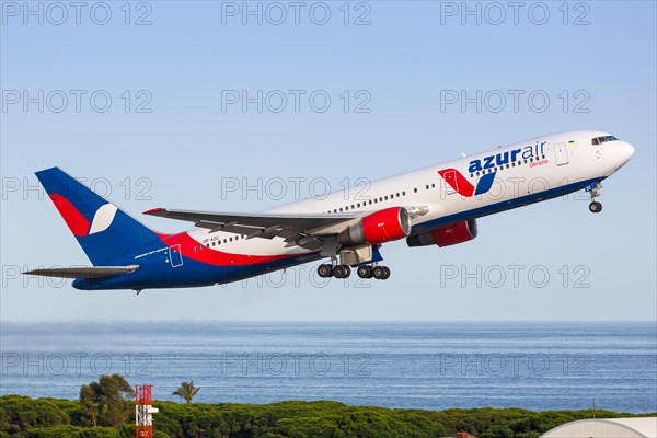 A Boeing 767-300ER of Azur Air Ukraine with the registration UR-AZC takes off from Barcelona Airport