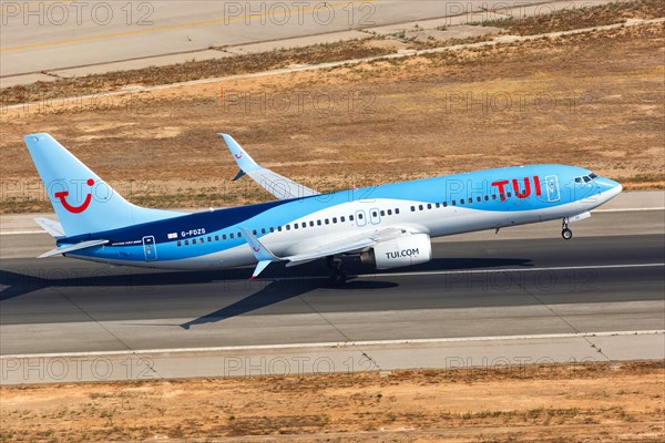 A TUI Boeing B737-800 with the registration G-FDZS takes off from Palma de Majorca Airport