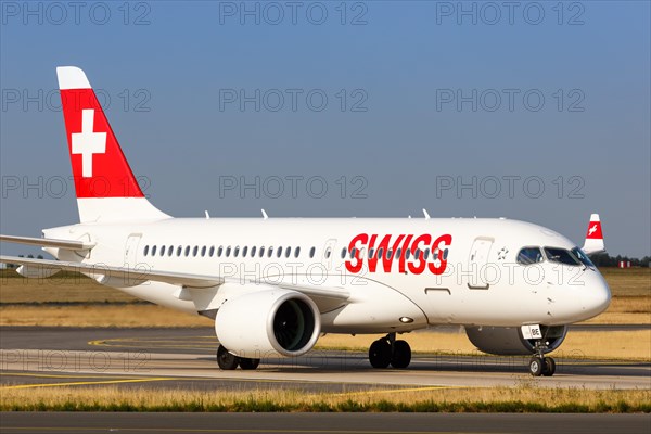 A Swiss Airbus A220-100 with registration HB-JBE at Charles de Gaulle Airport