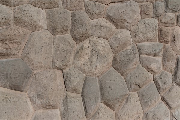 Precise stone setting in flower form of an Inca stone wall