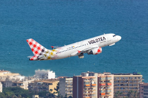 A Volotea Airbus A319 with the registration EC-MUX takes off from the airport in Palma de Majorca