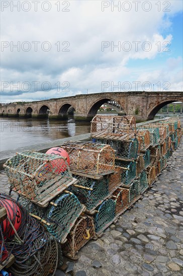 Crab fishing pots and sandstone one way bridge