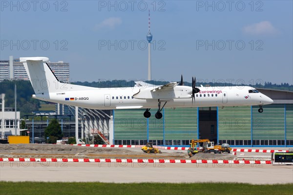 A Bombardier DHC-8-400 of Eurowings with the registration D-ABQQ lands at Stuttgart Airport