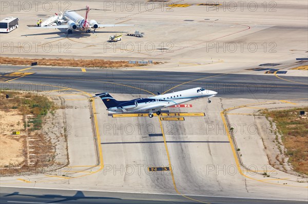 An Embraer ERJ-135BJ Legacy 650 aircraft of Air Hamburg with registration D-AHOX takes off from Palma de Majorca Airport