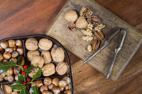 Edible nuts and nutcrackers on table at christmas