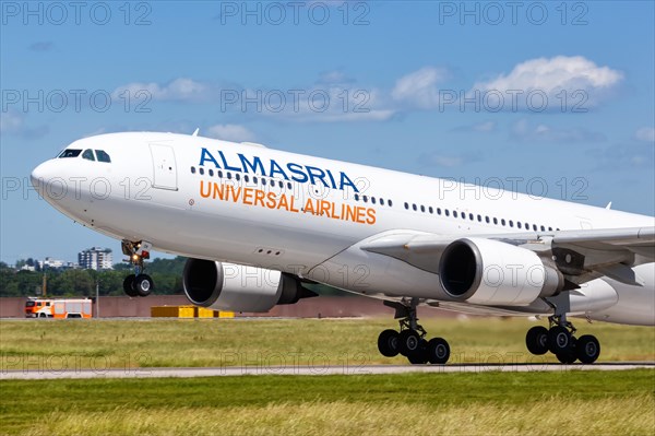 An Airbus A330-200 aircraft of Almasria Universal Airlines with the registration SU-TCH takes off from Stuttgart airport