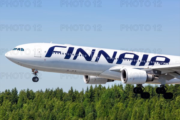 A Finnair Airbus A330-300 with the registration OH-LTN lands at Helsinki Airport