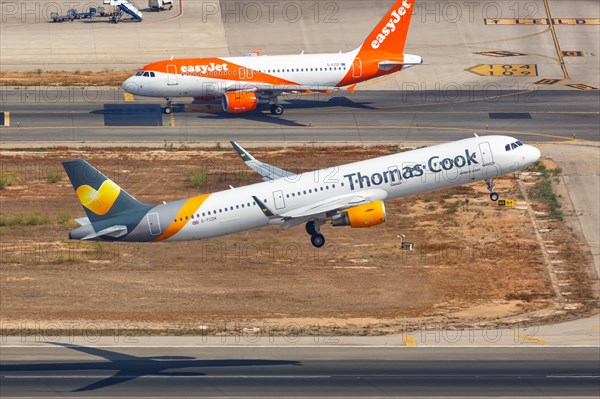 A Thomas Cook Airbus A321 with the registration G-TCDK takes off from Palma de Majorca Airport