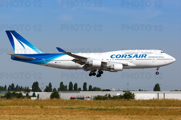 A Corsair International Boeing 747-400 with the registration F-GTUI lands at Paris Orly Airport
