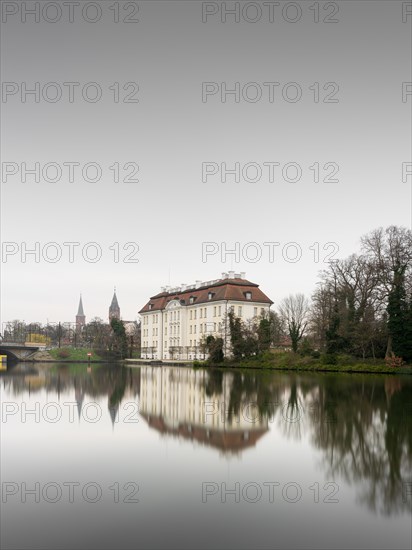 View over the Dahme river to Koepenick Castle in the morning in Berlin