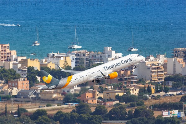 A Thomas Cook Airbus A321 with the registration G-TCDK takes off from Palma de Majorca Airport