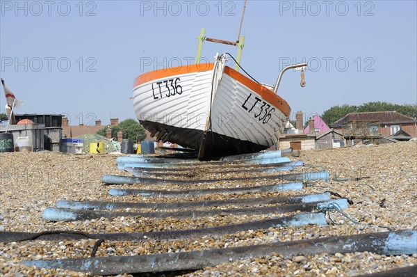 Fishing boat on shingle beach